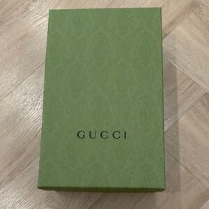 Gucci shoe box. Includes 2 unused dust bags. Mint condition.